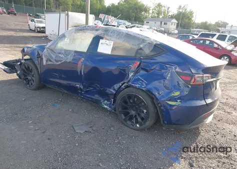 2023 Tesla Model Y from USA, damaged, VIN 7SAYGAEE9PF846733